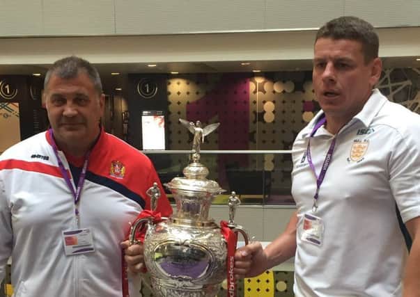 Shaun Wane (left) and Hull FC coach Lee Radford with the Challenge Cup