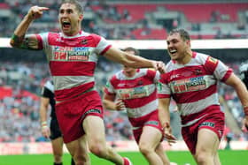 Sam Tomkins celebrates his try at Wembley in 2013