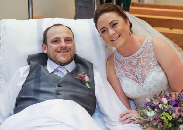 Steph and James Goss at their wedding in a Croatian hospital