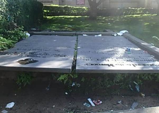Graves in Wigan Parish Church which have become damaged after groups of youths used them as seating