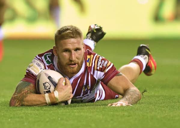 Sam Tomkins took his Wigan tries tally to 150