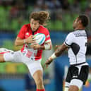 Great Britain's Daniel Bibby (left) and Fiji's Jasa Veremalua in action during the Rugby Sevens Men's Gold Medal Match