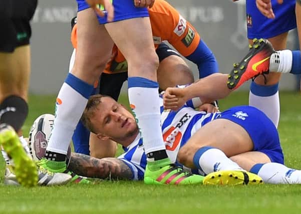 Dom Manfredi was injured in Wigan's loss to Castleford last Friday