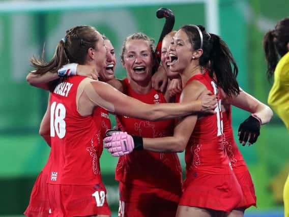 Great Britain's players celebrate at the end of the match following victory over New Zealand