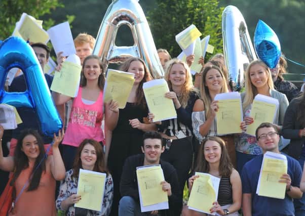 Students celebrate getting their A Level results at Winstanley College