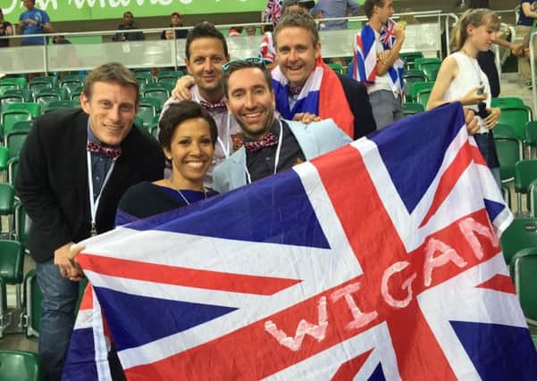Rich Bolton and his friends with Dame Kelly Holmes in the velodrome