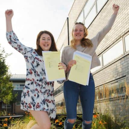 Rachel Stott and Rebecca Talbot celebrate their A-level results at Winstanley College
