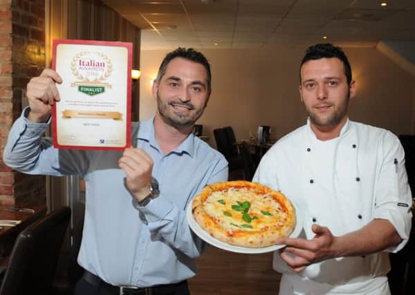 Restaurant owner Pasquale Iannone and pizza chef Rinaldo Lombardo