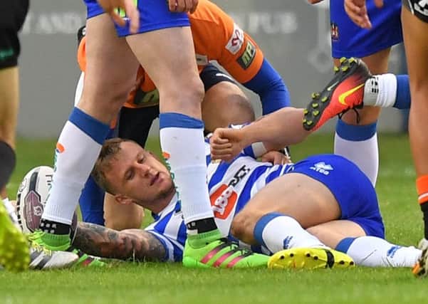 Dom Manfredi injured his knee in the 36-22 loss at Castleford