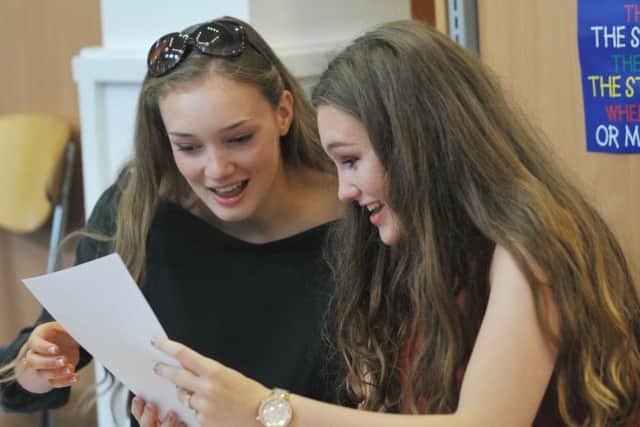Students get their GCSE exam results at Standish Community High School