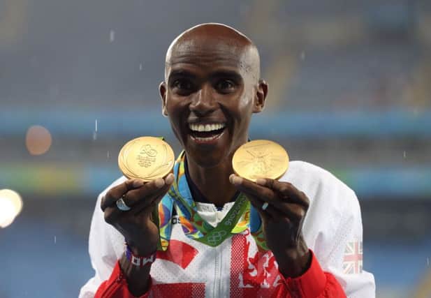 Olympic medallists - such as Mo Farah pictured - should not get gongs says a reader