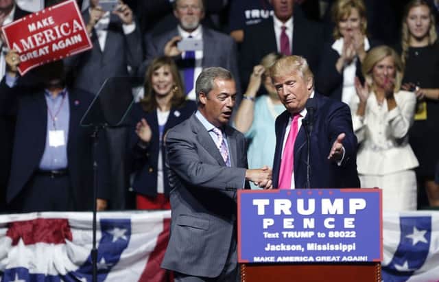 Republican presidential candidate Donald Trump with Nigel Farage, ex-leader of the British UKIP party, at a campaign rally