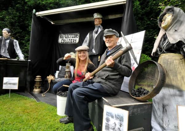 Former miner Frank Hollingsworth and Janine Musgrove at the Wigan Coal Mining Exhibition at Reflections Dementia Charity