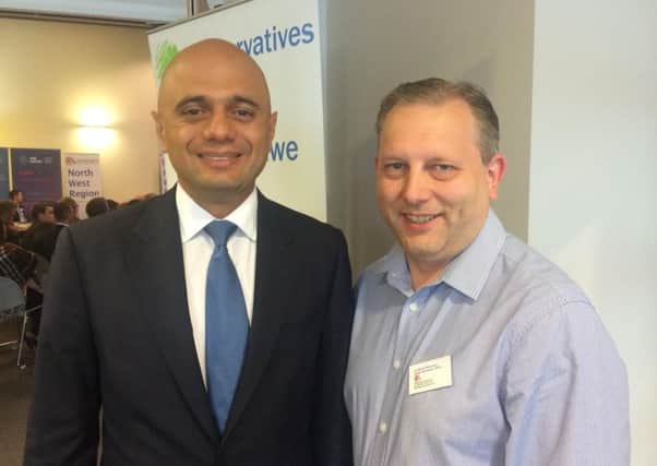 Coun Mike Winstanley (right) with secretary of state Sajid Javid