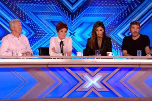 The X Factor judges listen to Olivia Garcia