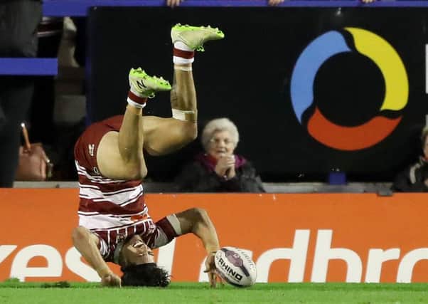 Anthony Gelling tumbles over as he scores the match-sealing try