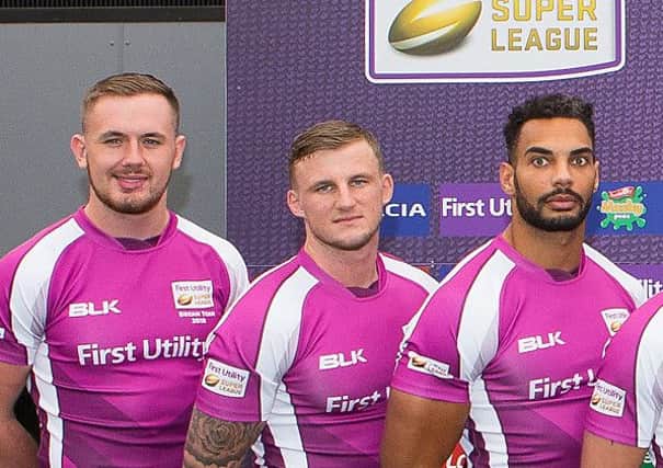 Dom Manfredi in the Dream Team, flanked by Warrington's Ben Currie and Ryan Atkins