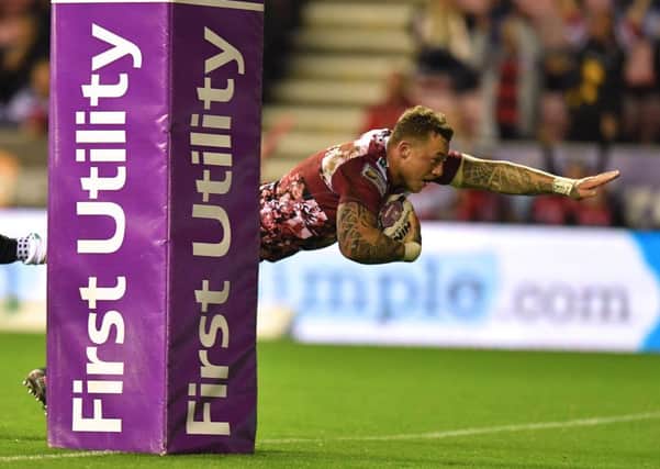 Josh Charnley flies over for a try