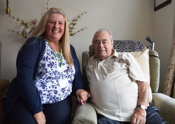 John Cooper, a service user at the Reablement Service run by Wigan Council, with Jo Whittaker