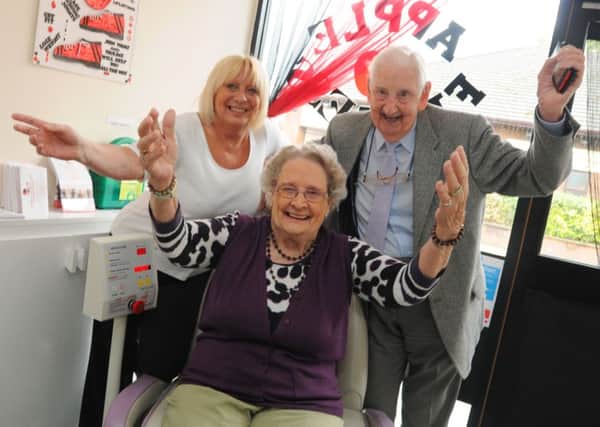 Dorothy with brother Gordon Fairhurst, right, and Pauline Astbury, left, owner of Apple Fitness.