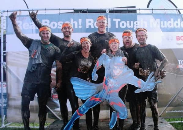 Compassion In Action patron Leanne Rhead with friends and family tackling Tough Mudder