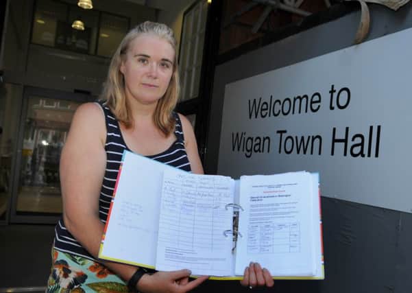 Vicky Galligan gets ready to hand over the petition with over 1,900 signatures to Wigan Town Hall