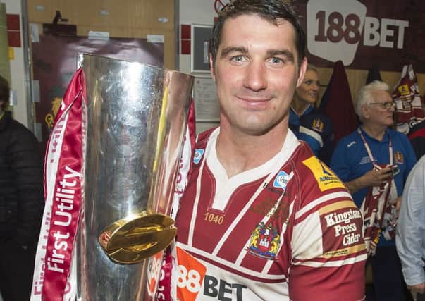 Matty Smith with the Super League trophy