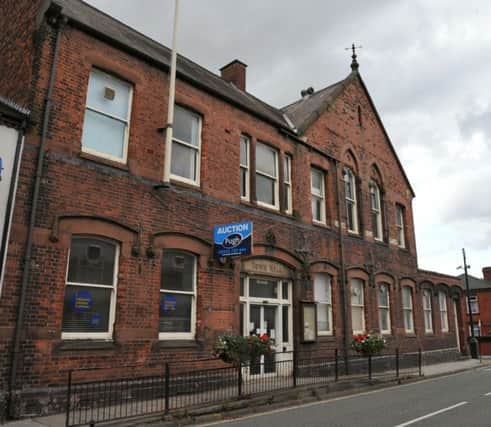 Ashton Town Hall in Wigan might not be the best location for a health centre says a reader. See letter