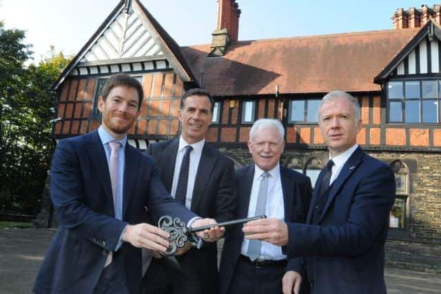 Ffrom left, Viscount Newport gives the key to the estate to Phil Clarke, Ian Lenagan and Andy Clarke