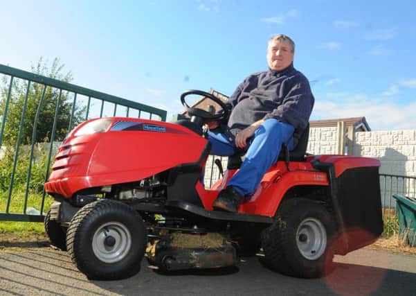 Coun Bob Brierley on his lawn mower