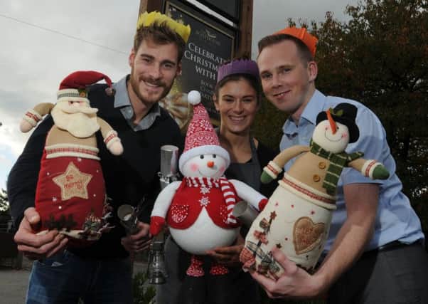 Staff at The Boathouse, Appley Bridge, from left, director Grant Ainsworth, Laura Rogers and Nathan Jones, promote their Christmas market event with stalls, food and drink to get into the festive spirit.