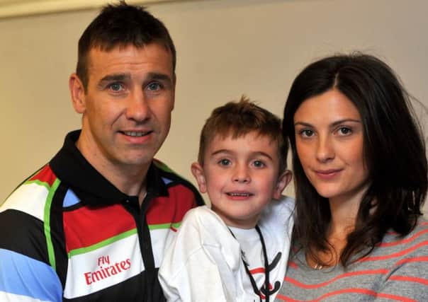 Andy Johnson with son Jack and wife Alex