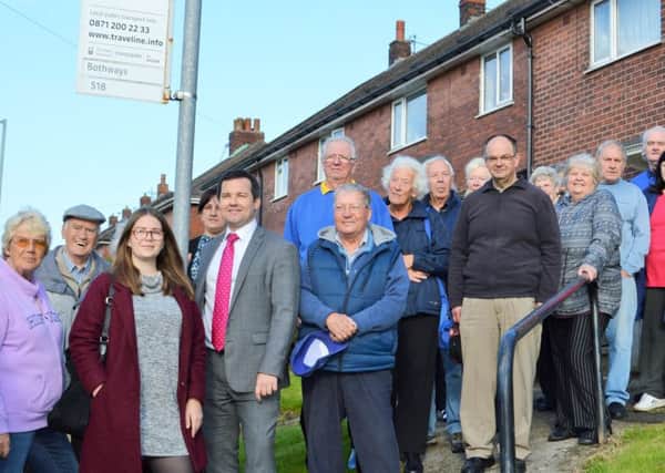 Residents with Bolton West MP Chris Green complaining about bus route cuts