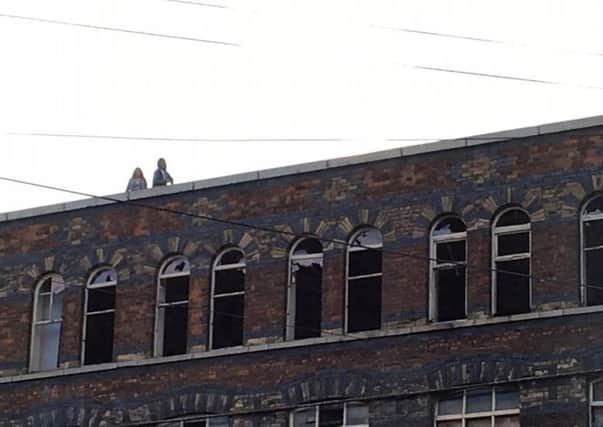 Youngsters spotted on the roof of the Pagefield building