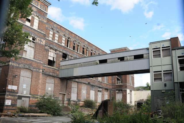 The old Pagefield building, behind Mesnes Park, Wigan, which is being slowly demolished