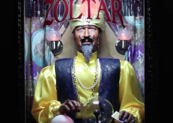 An image from Wigan Council's new advert in which Zoltar the fortune-teller declares the borough has an economic plan