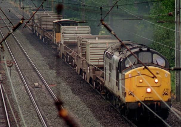 A freight train believed to be carrying nuclear waste to the Sellafield Nuclear Plant in Cumbria passes through