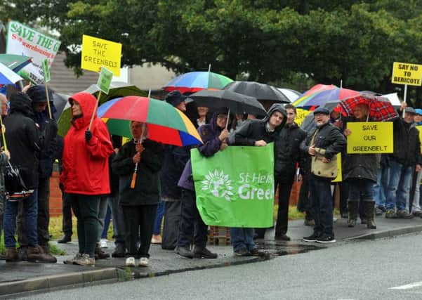 Caroline Lucas, leader of the Green Party, visits Haydock residents protesting on Liverpool Road, Haydock, about a planning application to build two large warehouses on the site of North Florida Farm, Haydock