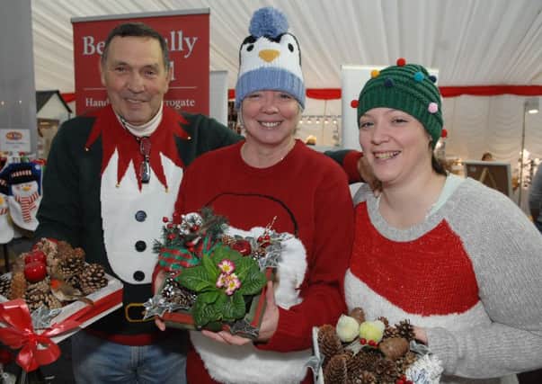 A Christmas Market last year: Roy Higgins, Alli Robinson and Leigh Anne Borrill on their stall