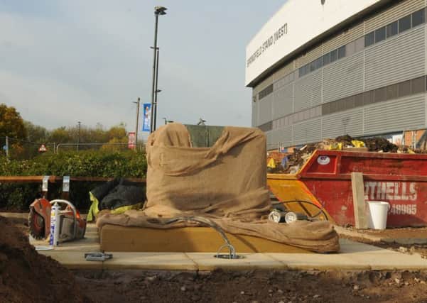 The ground is being prepared and a plinth is in place, ready for the Dave Whelan statue, at the front of DW Stadium