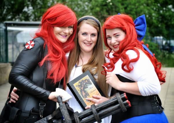Nannon Wills as Nightshade, Andrea Wonderland as Alice and Caitlin Gilgannon as Ariel

 at last year's Comic Con at Robin Park Sports Centre