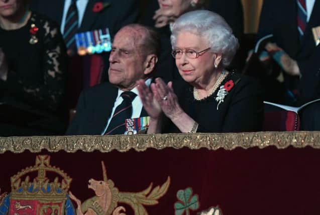 Queen Elizabeth II and the Duke of Edinburgh attend the annual Royal Festival of Remembrance at the Royal Albert Hall. See letter