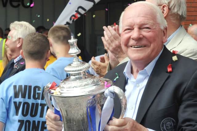 Dave Whelan with the FA Cup outside Wigan Youth Zone