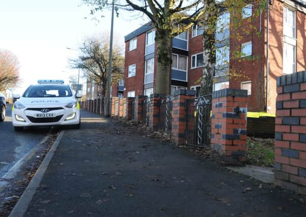 A police cordon at the scene of a fire at the flat in Scholes