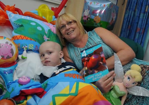 Charlie Taylor in hospital on his fourth birthday with his Nan Veronica Marriott