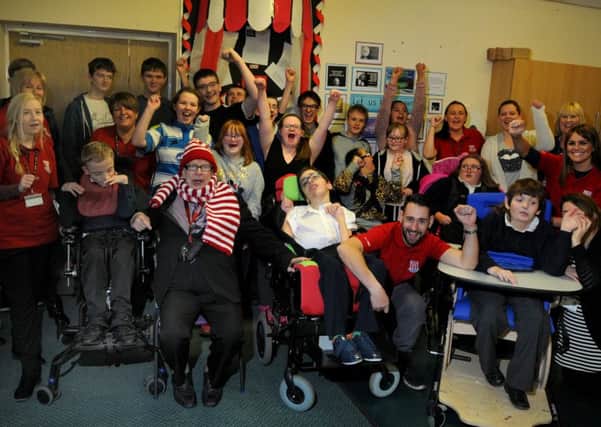 Staff and pupils at Hope School with Neil Baldwin, known as Nello the clown