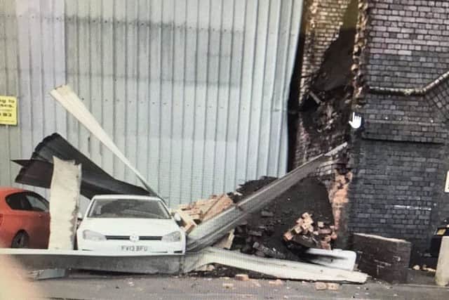 Damage near the arches at the rear of Wigan North Western