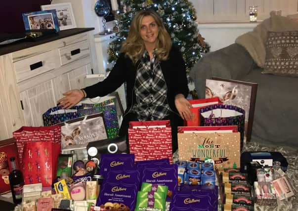 Kathryn Leyden with just some of the donations she has recieved so far
