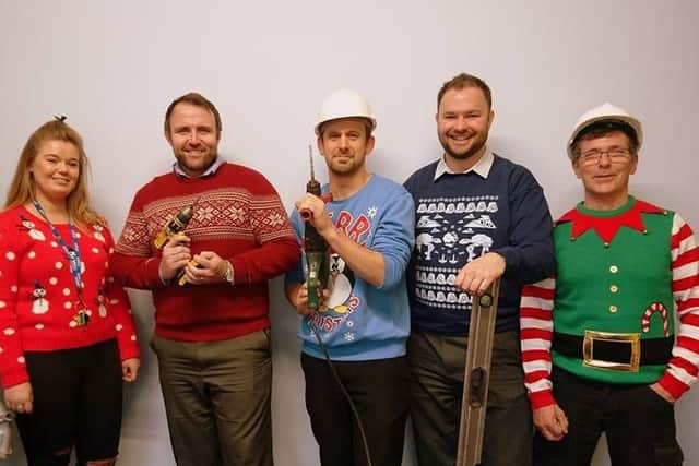 Staff at DMR Training and Consultancy Limited show their support for Josephs Goal by wearing Christmas jumpers