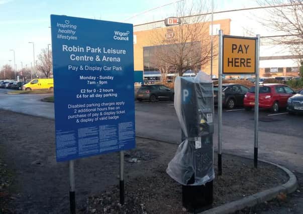 A pay and display machine outside the gym at Robin Park